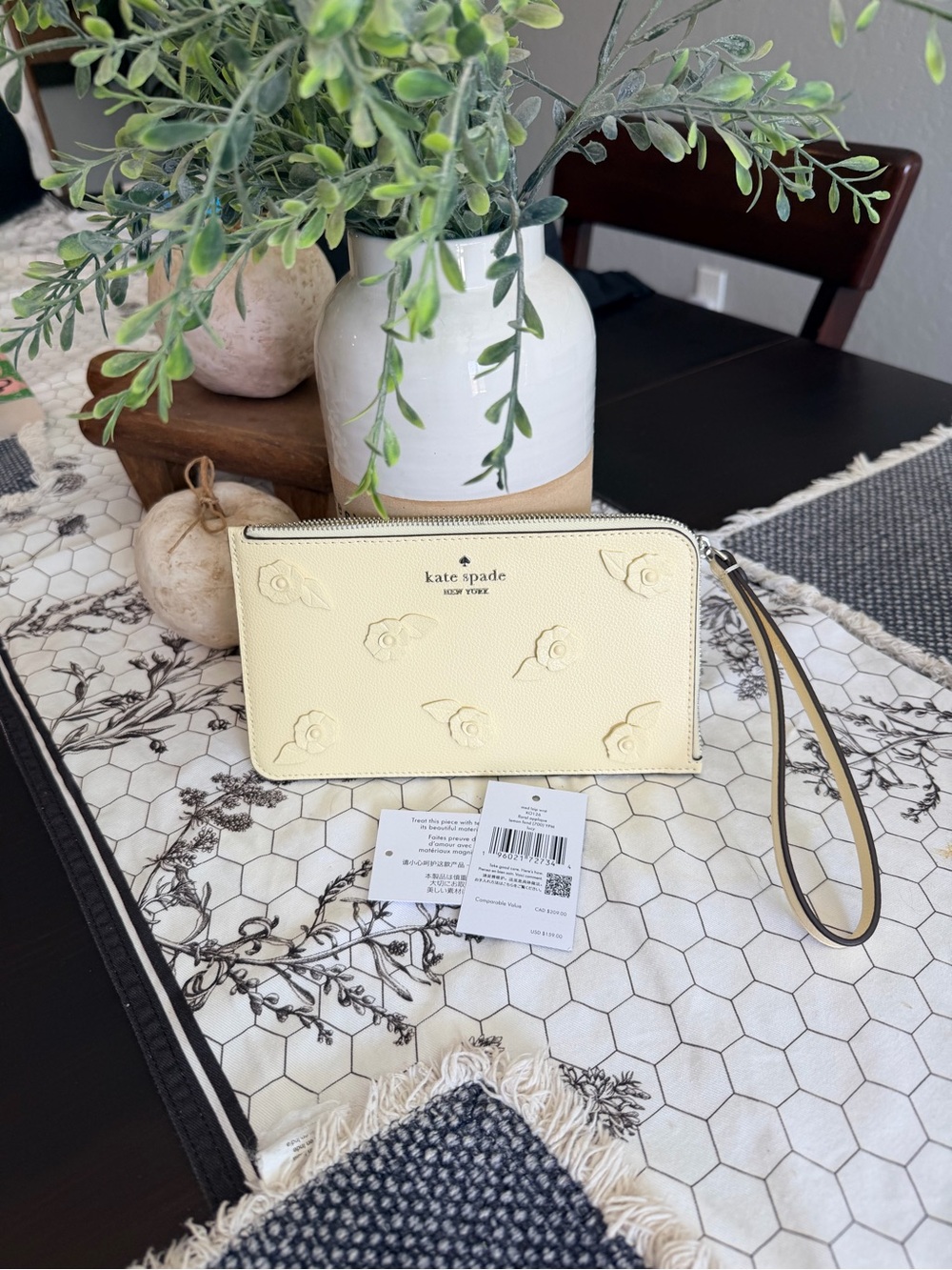 kate spade Pale Yellow Leather Floral Embossed Wristlet